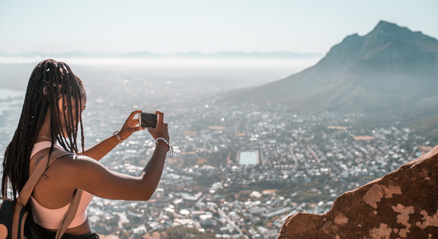 Young woman making the photo of Cape Town, South Africa.